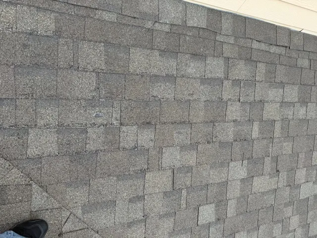 Roofing shingles on a sloped surface, demonstrating quality materials used in roof replacement services by American Masters Roofing & Restoration in Melbourne.